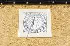 Middleham, Wensleydale, North Yorkshire, England. Sundial at the ruins of Middleham Castle. Art Print